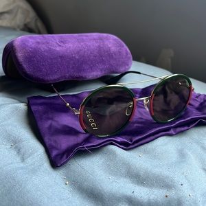 Brand new Gucci sun glasses never been worn %100 authentic